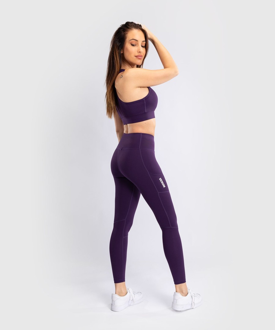 venum essential women medium impact sports bra - deep purple