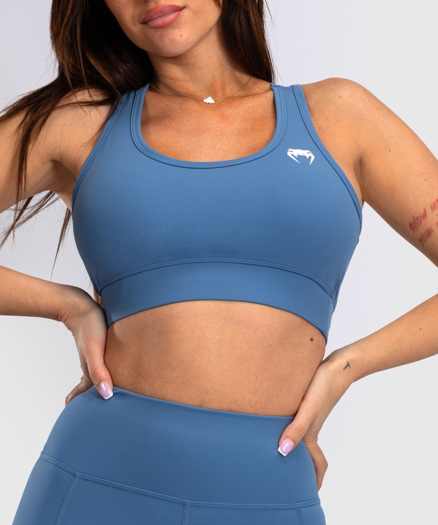 venum essential women medium impact sports bra - storm blue