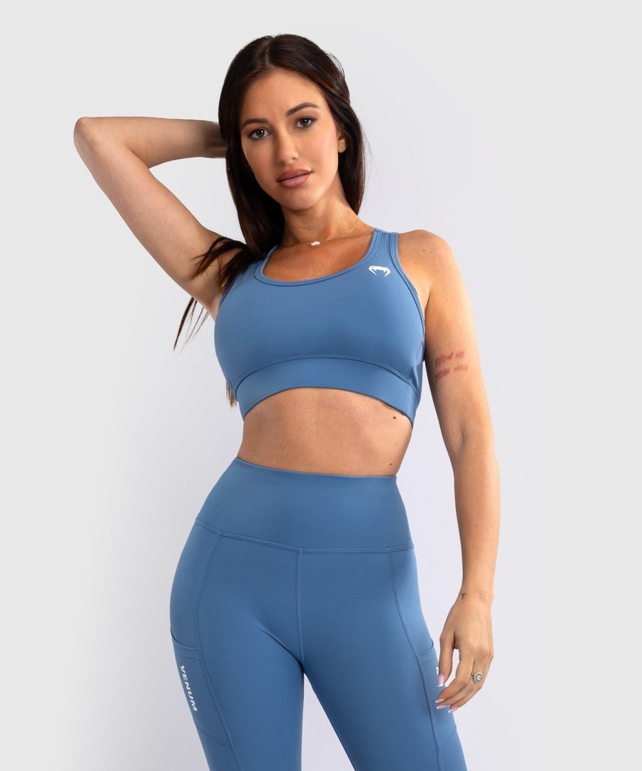 venum essential women medium impact sports bra - storm blue