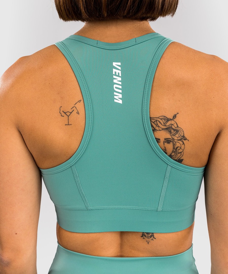 venum essential women medium impact sports bra - aqua green