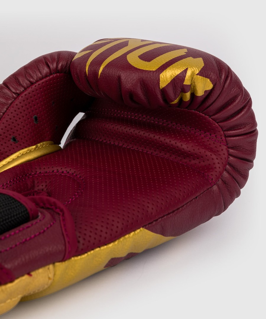 venum reverso boxing gloves - cherry red gold